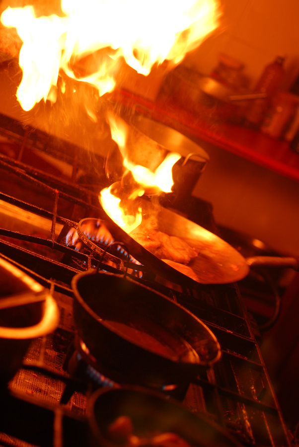 Image of grease fire on kitchen stove